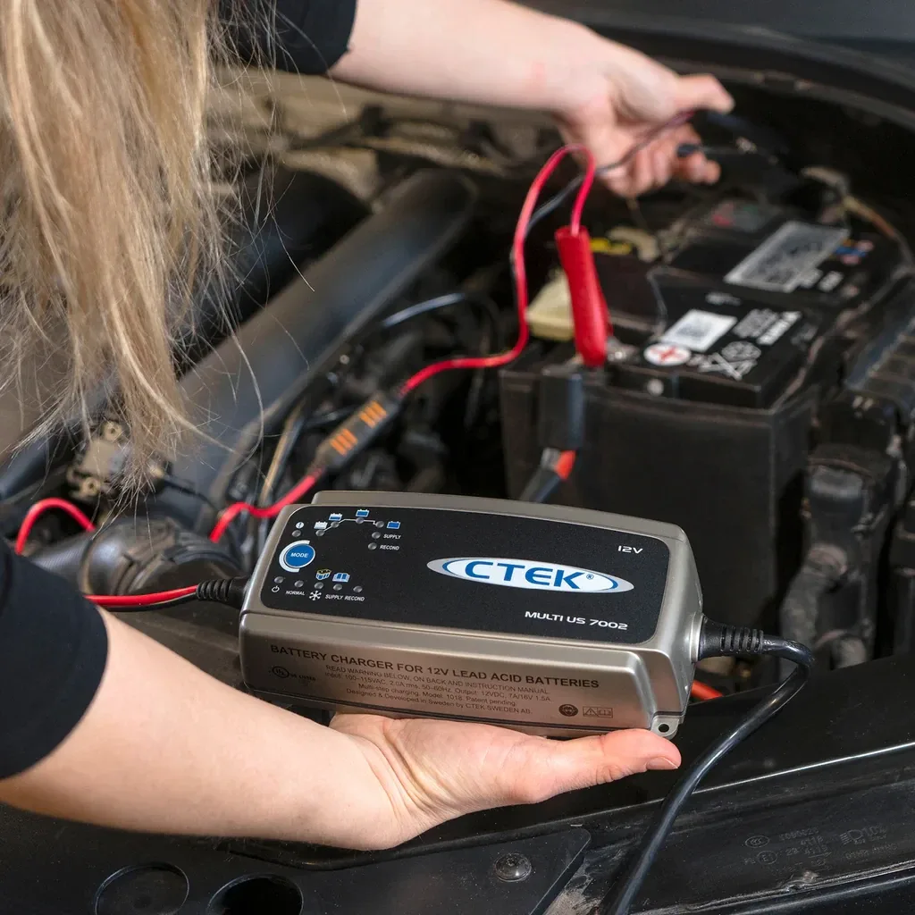 Multi-stage battery maintainer connected to a car battery via a ring terminal pigtail